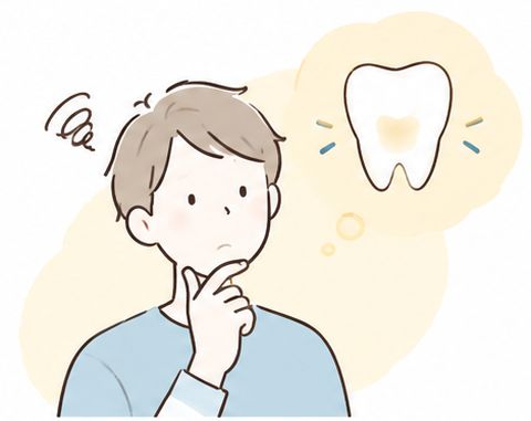 詰め物の変色を気にする男性のイラスト
